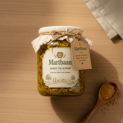Top-down view of a glass jar of Martbaan Sarso Ka Achar on a wooden surface, showing vibrant mustard seeds and a rustic label